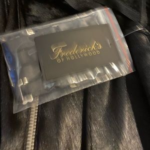 Black corset zipper in the front and lace on back